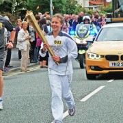 Anna Hulme runs with Olympic Torch