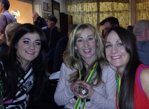 Kirsty Longley shows off her awards