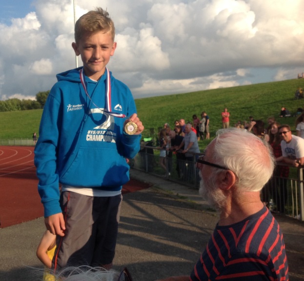 Owen Southern set a new Under 13 club high jump record with 1.55 at Wavetree, he was presented with his medal by Jim Green