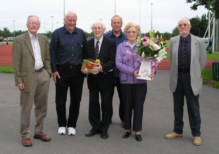 Club President Les Williams and his wife Brenda receive a presentation on behalf of the club for his long service. Left to Right, Leo Carroll Chairman of Merseyside County AA, Charles Gains Les Williams, Wally Bridson, Brenda Williams, Derek Pellatt.