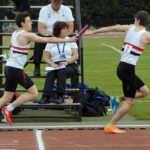 Relay change-over Ed Latimer to Joe Milton