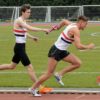 Joe Milton (400m)& Luke Edwards taking the baton for the final leg of 400m relay