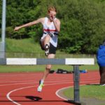 Adam Jones on route to Under 20 steeple chase title