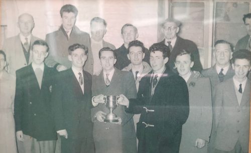 Sefton Harriers 1956 Back row Teddy Rogers, Malcolm?, Bob Mount, Albert Marsden, Andy Byrne, Jack Caldwell (half in photo) Front Row Bert Searle (half in photo)Ken Woolridge, Mike Hoyeland, Chris Marsden, Vin Rogers, Steve Rogers, Brian Fozard, Alf Glaister, Brendan Deary,