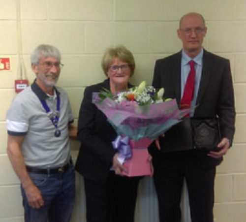 Bob Brimage presents Margaret and Andrew Bridson  with the award 
